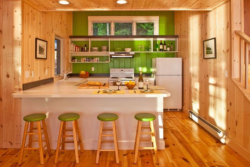 Uso di pittura semilucida verde per una casa in legno