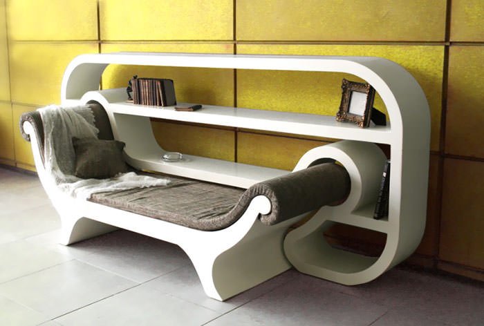 Divano moderno angolo lettura inserito nella libreria - ispirazione arredamento zona relax